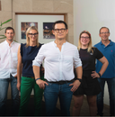 Group photo of the Gheta team with founder Massimo Bonsembiante in front, Stefania Pinel on the left and team members in the background.